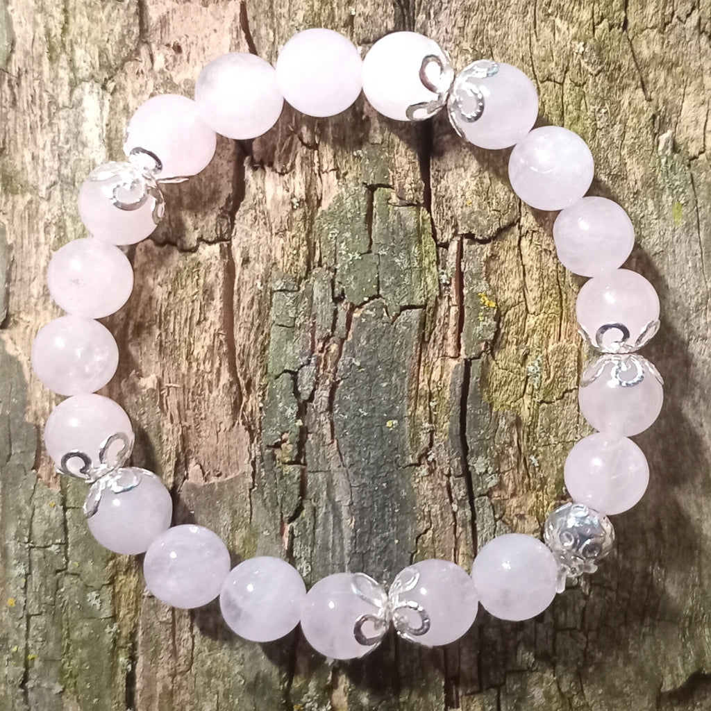 Armband aus Rosenquarz mit silbernen Perlkappen und 1 Silberperle