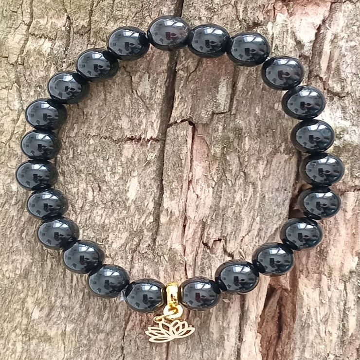 Onyx Armband mit goldener Lotusblüte