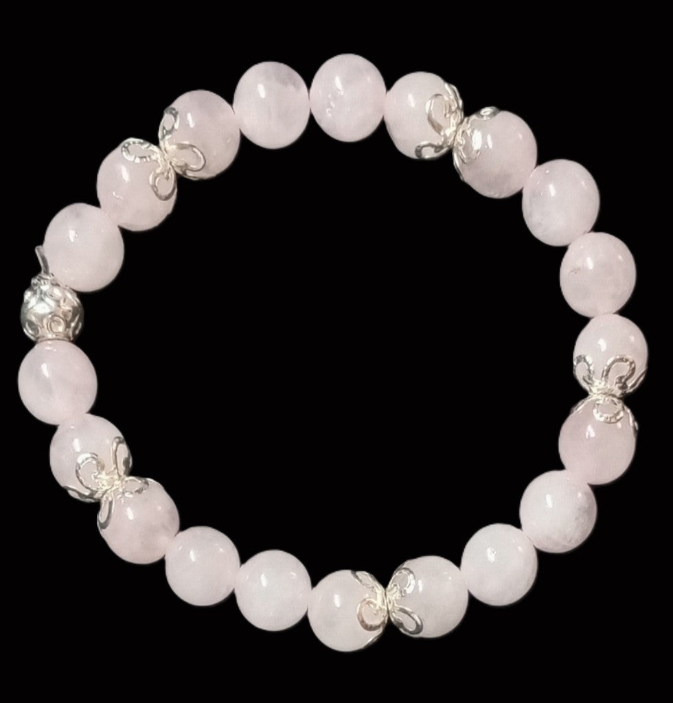 Armband aus Rosenquarz mit silbernen Perlkappen und 1 Silberperle