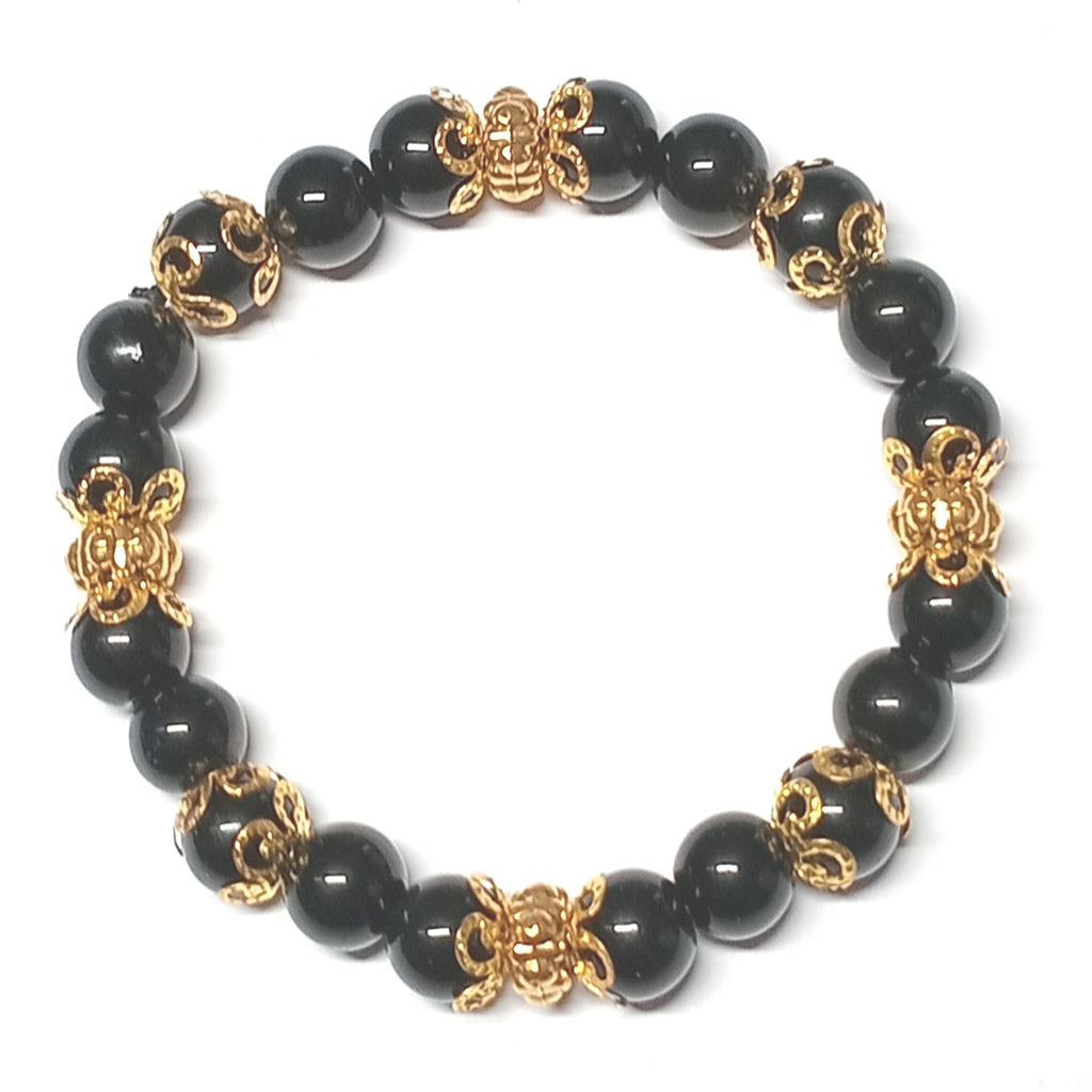 Onyx Armband in schwarz mit goldenen Perlkappen und Goldperlen