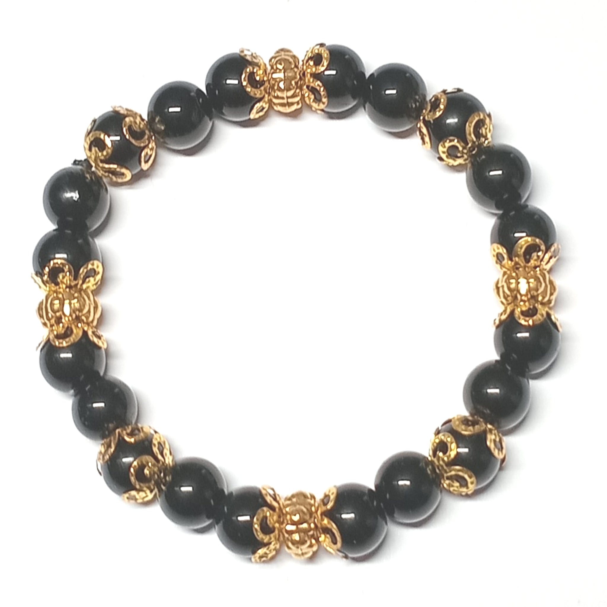 Onyx Armband in schwarz mit goldenen Perlkappen und Goldperlen
