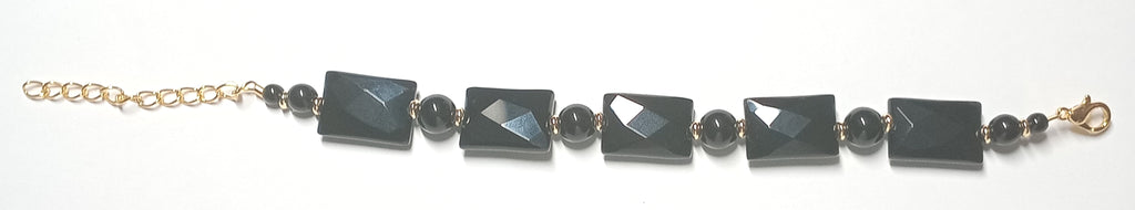 Schöne Armkette aus schwarzem Onyx mit Gold-Spacern und tollem Glanz