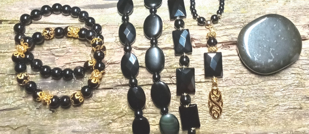 Schöne Armkette aus schwarzem Onyx mit Gold-Spacern und tollem Glanz